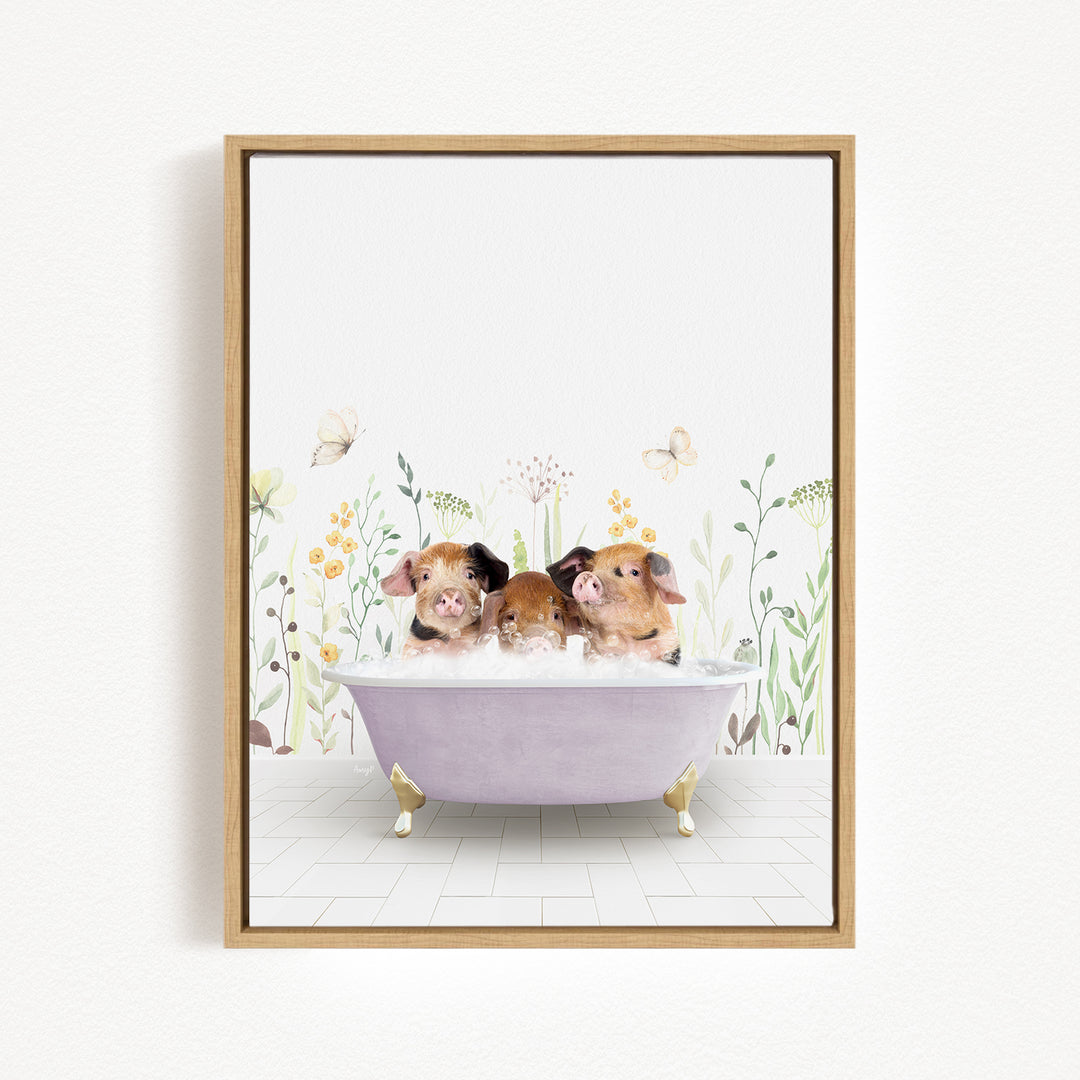 A framed print depicting three adorable pigs sitting in a bathtub filled with bubbles, surrounded by flowers and butterflies.