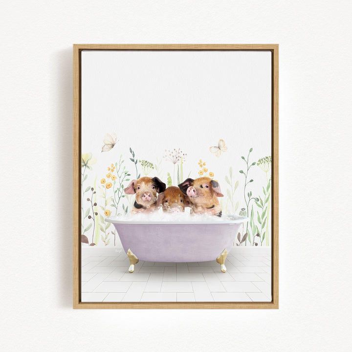A framed print depicting three adorable pigs sitting in a bathtub filled with bubbles, surrounded by flowers and butterflies.