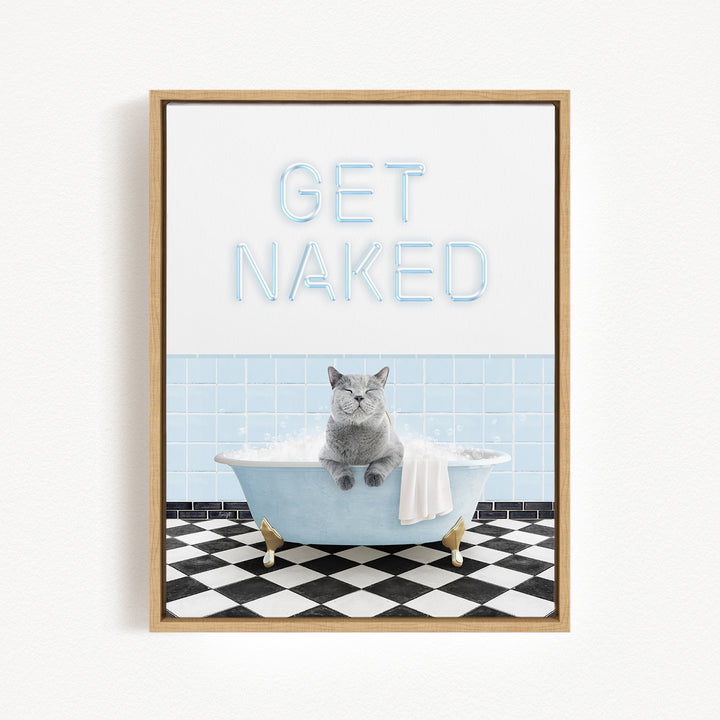 A framed image depicting a gray cat sitting in a blue bathtub, with the text "GET NAKED" displayed above it.