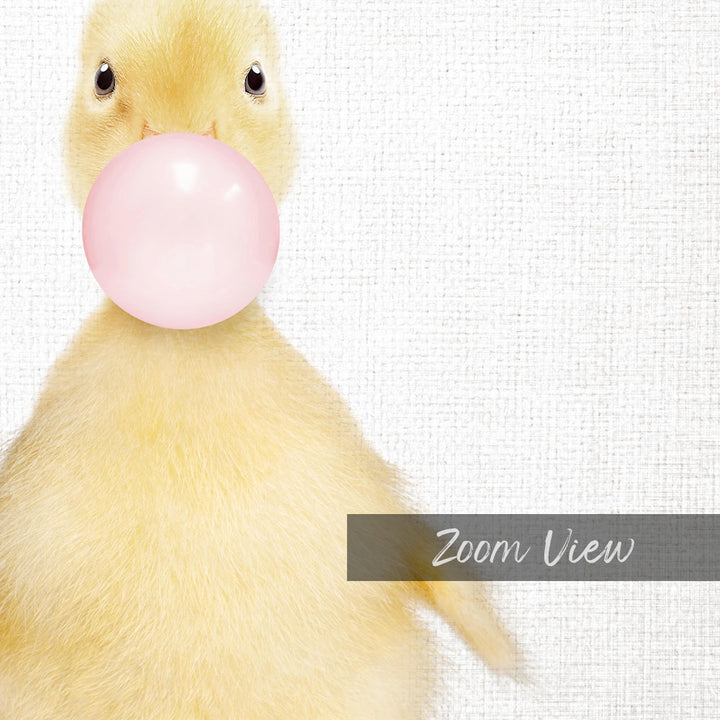 A cute yellow duck blowing a bubble with a pink bubble gum bubble.