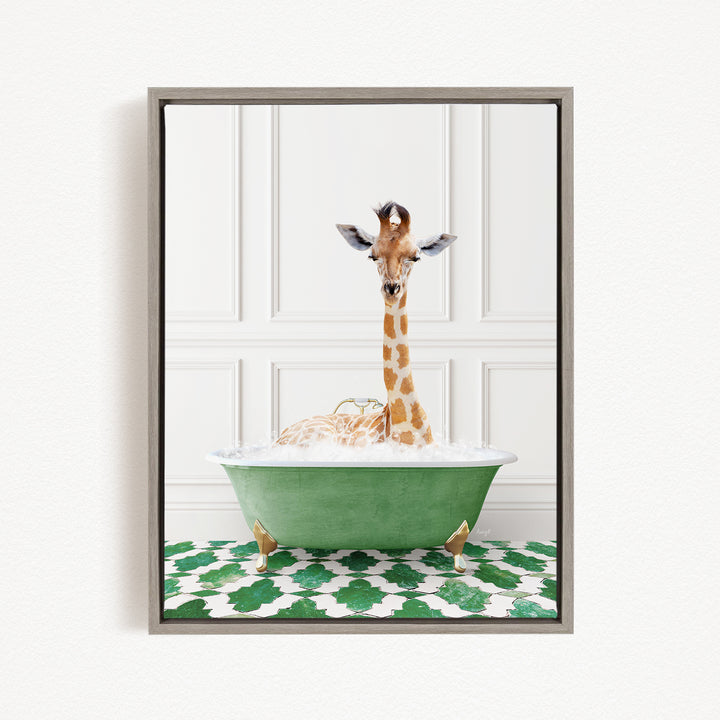 A giraffe is sitting in a green bathtub filled with water, with its head raised above the tub.