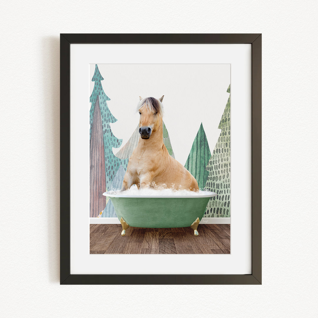 A horse is sitting in a green bathtub, surrounded by trees and a snowy landscape.