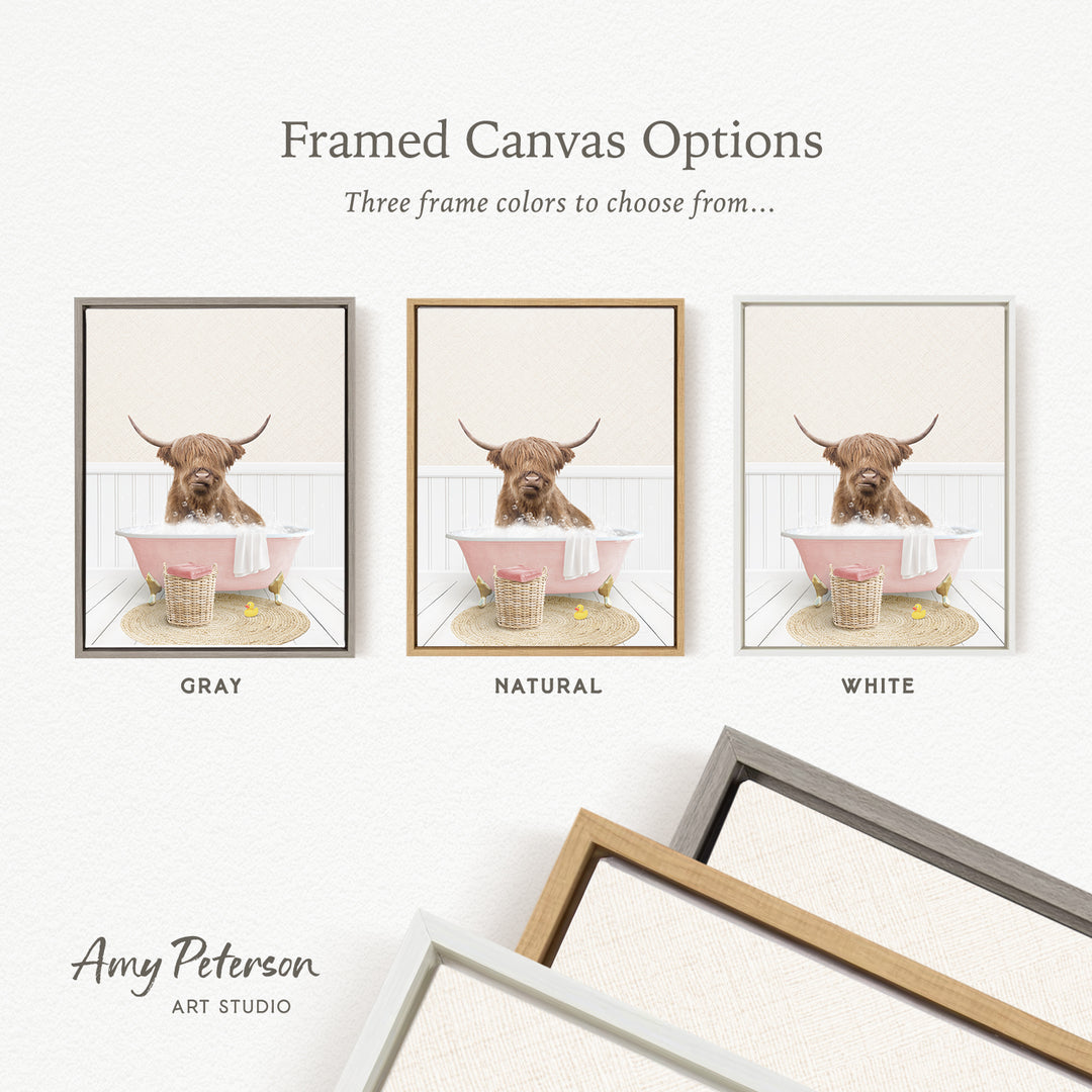 The image is a framed canvas option featuring a brown cow with horns sitting in a pink bathtub, with three different frame colors to choose from: gray, natural, and white.