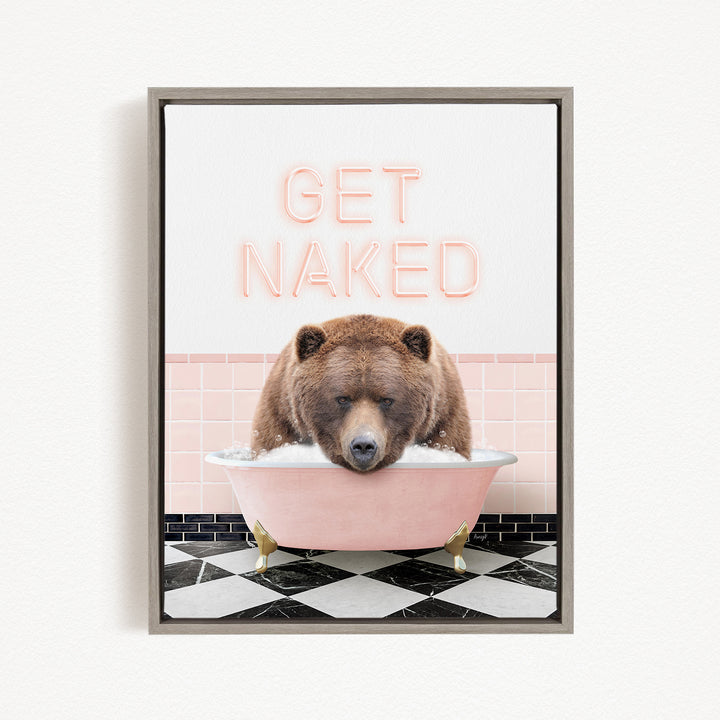 A brown bear is sitting in a pink bathtub, with the text "GET NAKED" displayed above it.