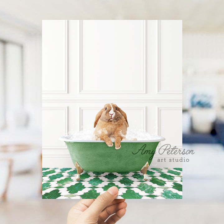 a person holding a card with a picture of a rabbit in a bathtub