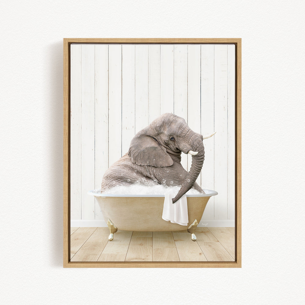 A gray elephant is sitting in a bathtub filled with water, with its trunk submerged in the water.