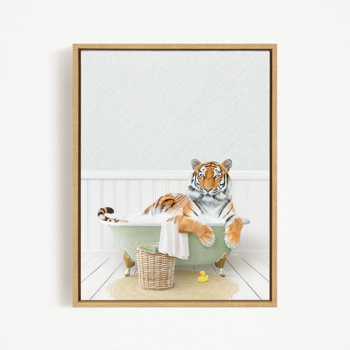 A tiger is sitting in a green bathtub filled with water, surrounded by rubber ducks and a basket.