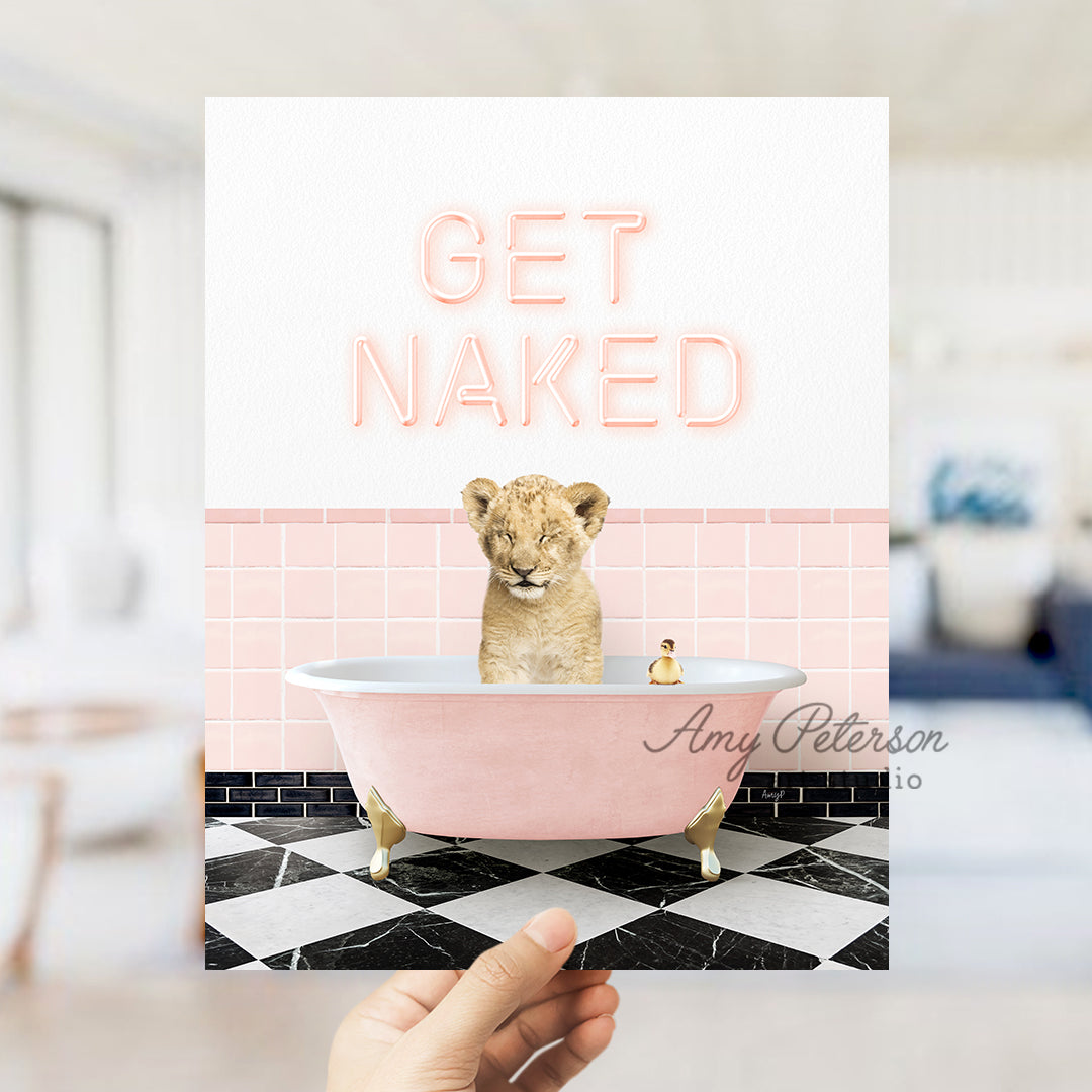 a person holding up a card with a picture of a baby lion in a bath