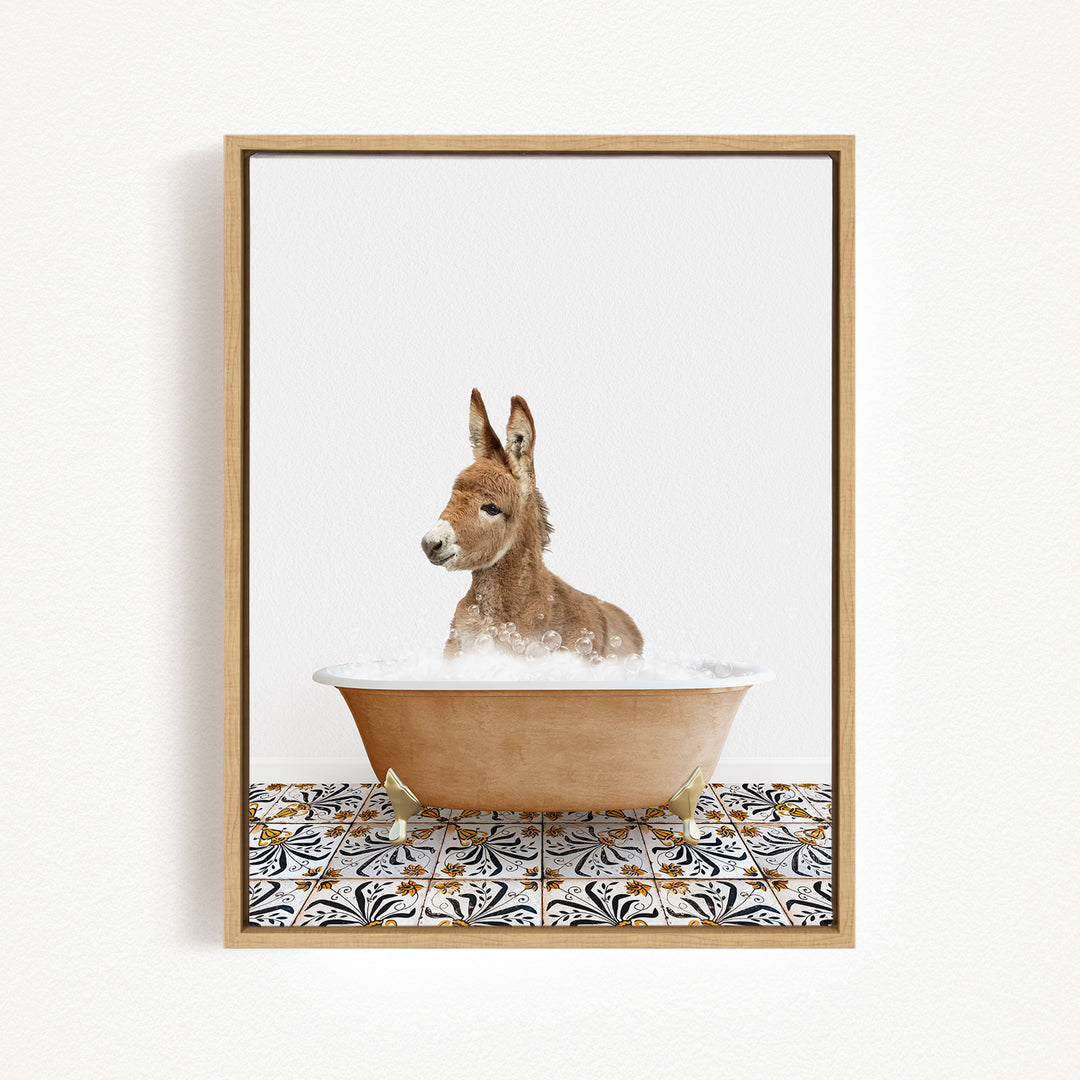 A donkey is sitting in a bathtub filled with bubbles, creating a playful and whimsical scene.