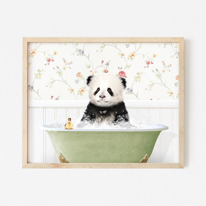 a panda bear sitting in a bathtub with flowers on the wall