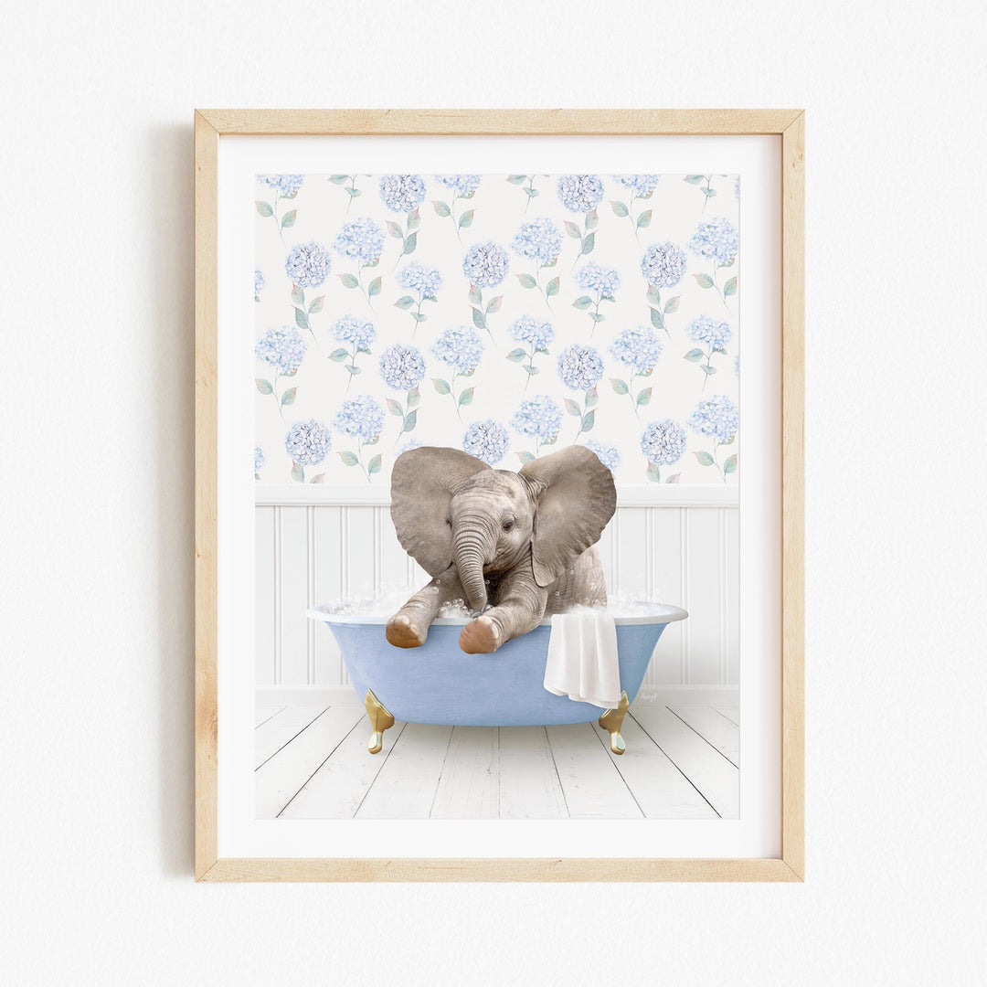 A baby elephant sitting in a blue bathtub, surrounded by a floral patterned wall.