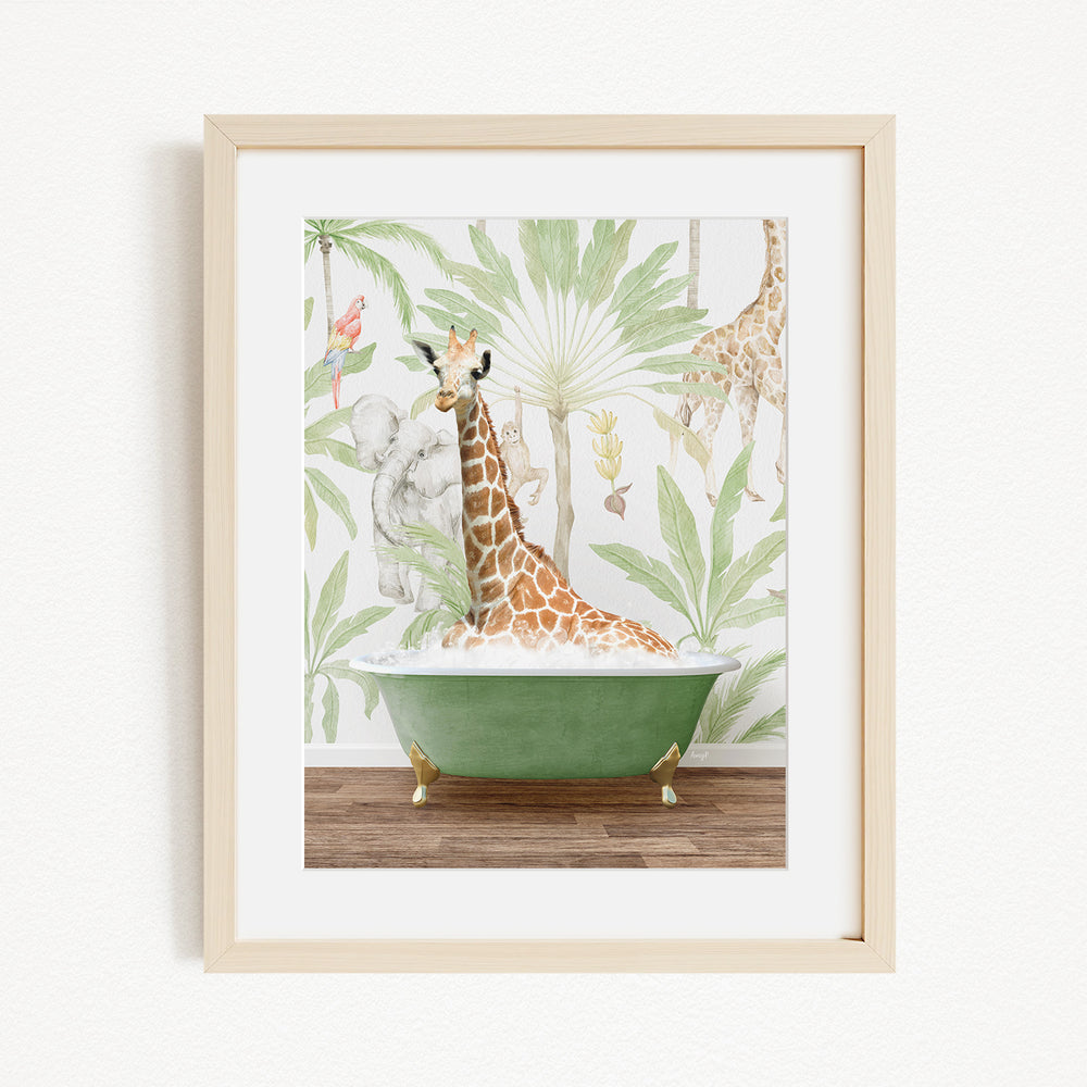 A giraffe is sitting in a green bathtub, surrounded by tropical foliage, in the image.