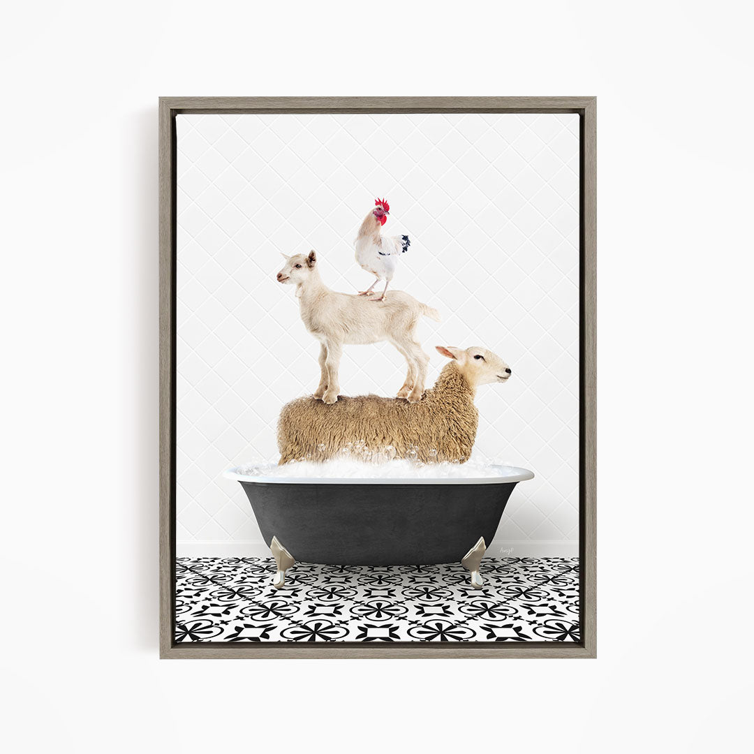 A framed image depicting a sheep standing on a tub filled with water, with a chicken perched on top of the sheep and a lamb standing on the tub's rim.