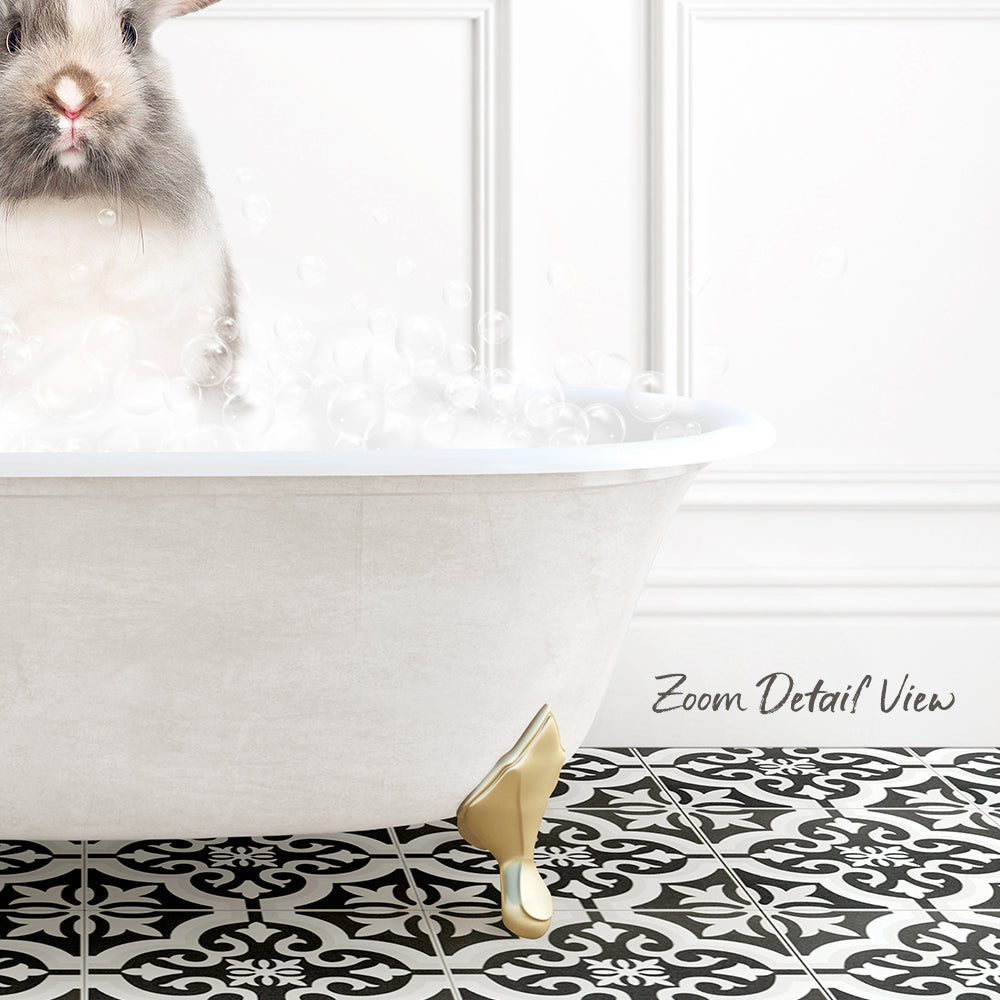 A white bathtub filled with bubbles, with a small rabbit sitting inside and enjoying the bath.