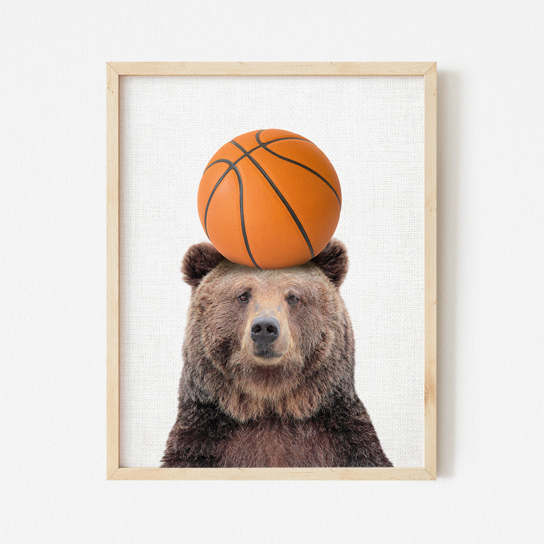 a picture of a bear with a basketball on its head