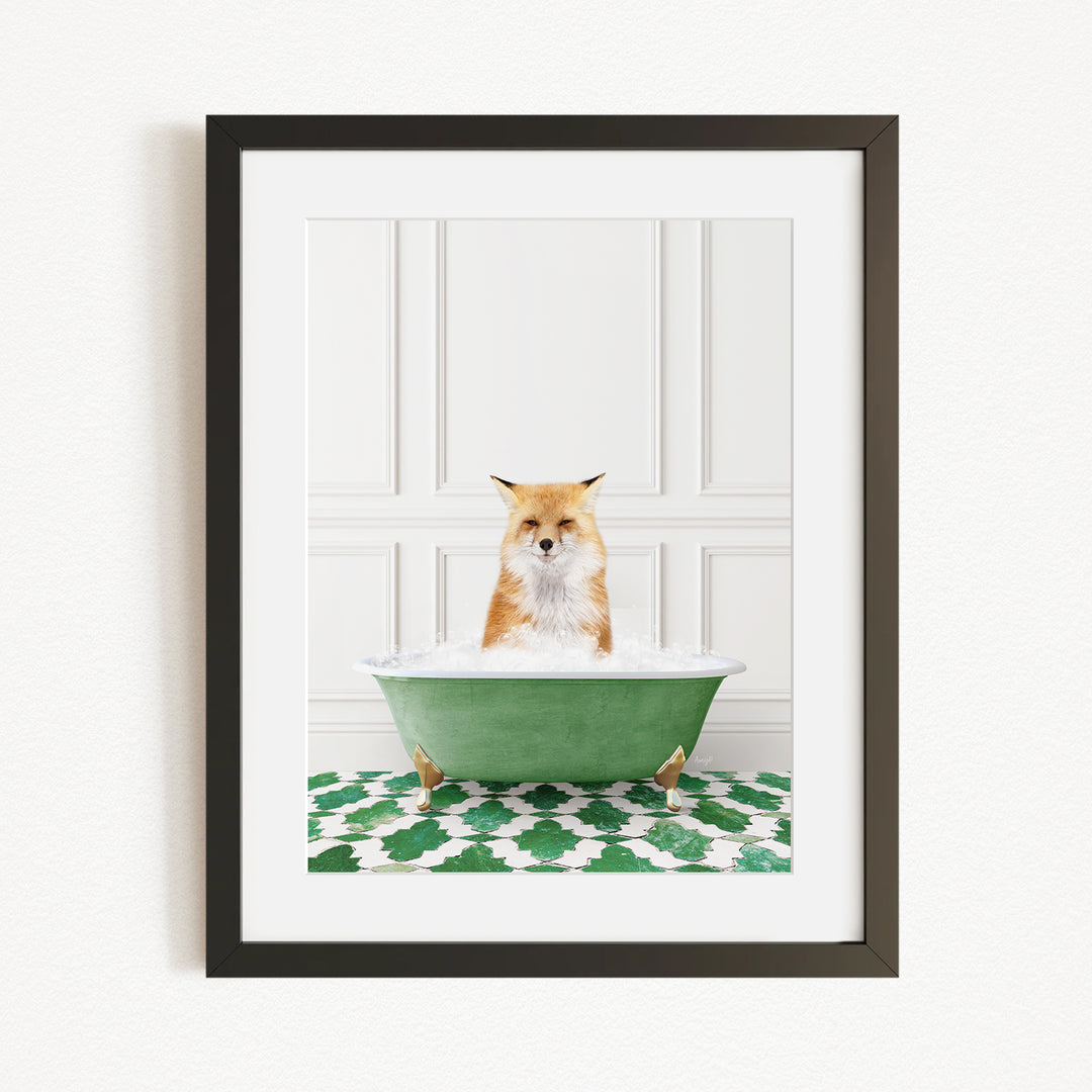 A red fox is sitting in a green bathtub filled with water, with a green and white patterned rug on the floor.