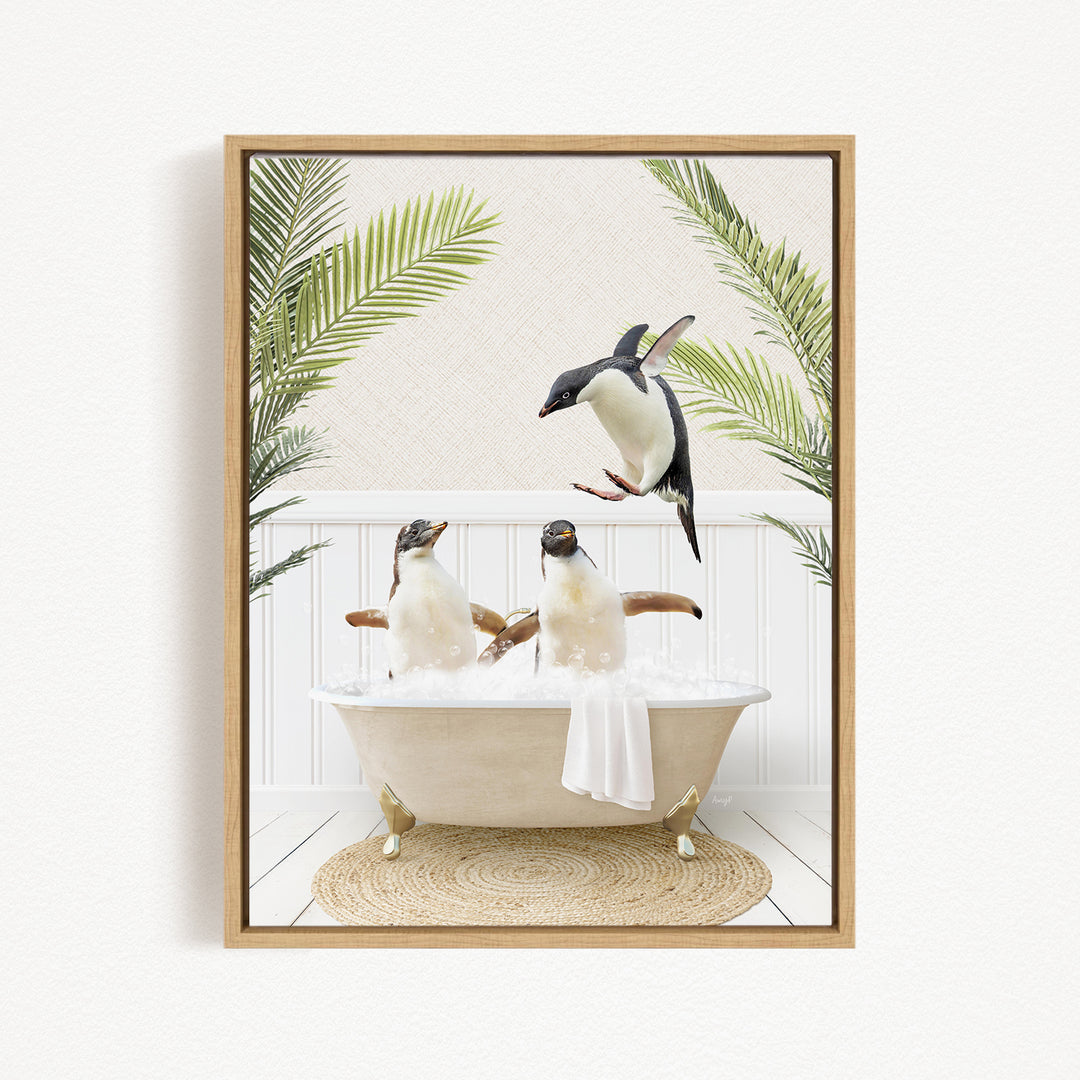 A framed image depicting three penguins sitting in a bathtub, surrounded by palm leaves, creating a whimsical and playful scene.