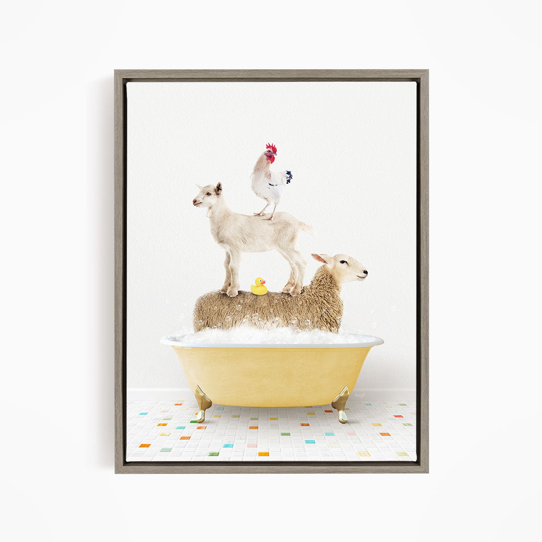 A framed image depicting a sheep standing on a goat's back while a chicken stands on top of a sheep in a yellow bathtub.