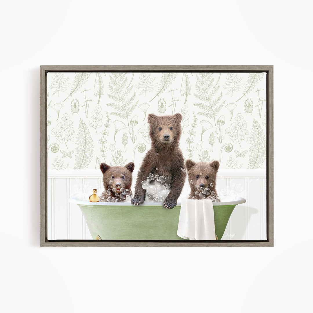 Three adorable brown bears sitting in a green bathtub, enjoying a relaxing bath.