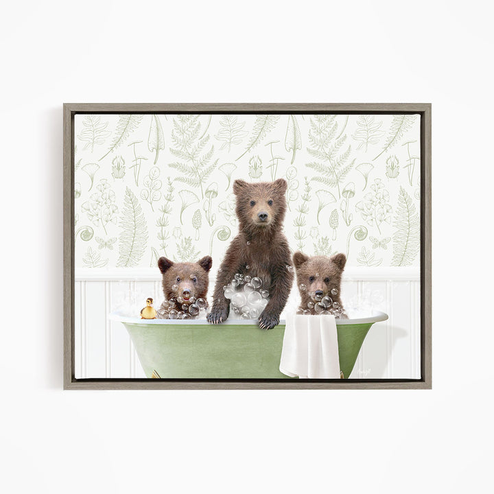 Three adorable brown bears sitting in a green bathtub, enjoying a relaxing bath.