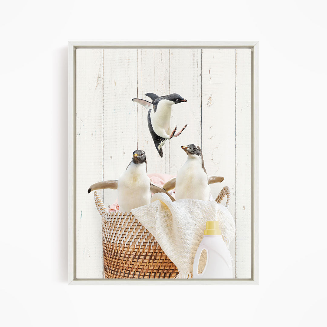 A group of penguins sitting in a woven basket, with a bottle of detergent nearby.