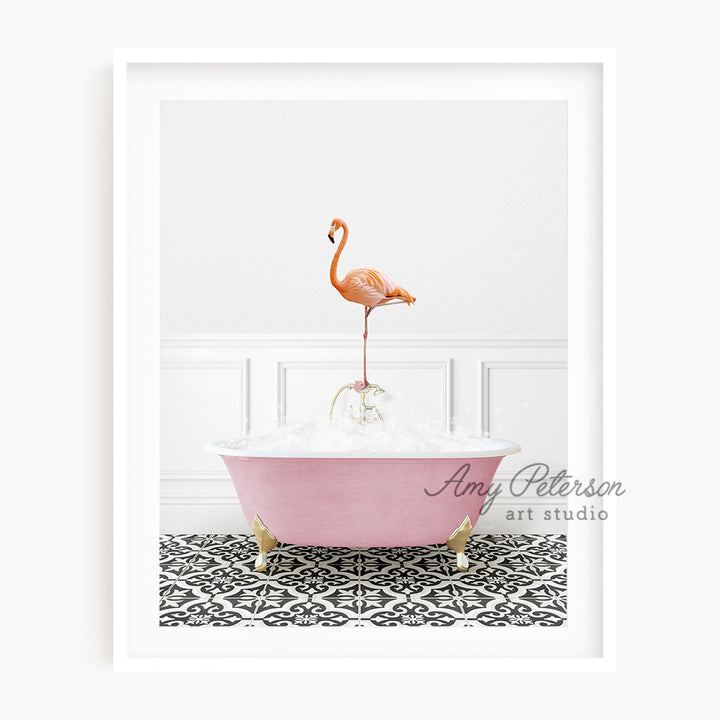 a pink bathtub with a pink flamingo standing on top of it