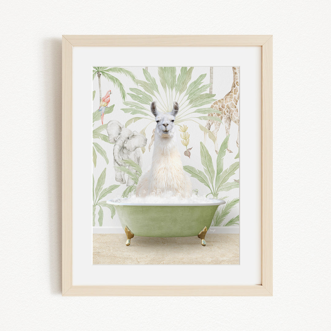 A framed image depicting a white llama sitting in a green bathtub, surrounded by a tropical jungle-themed wallpaper.