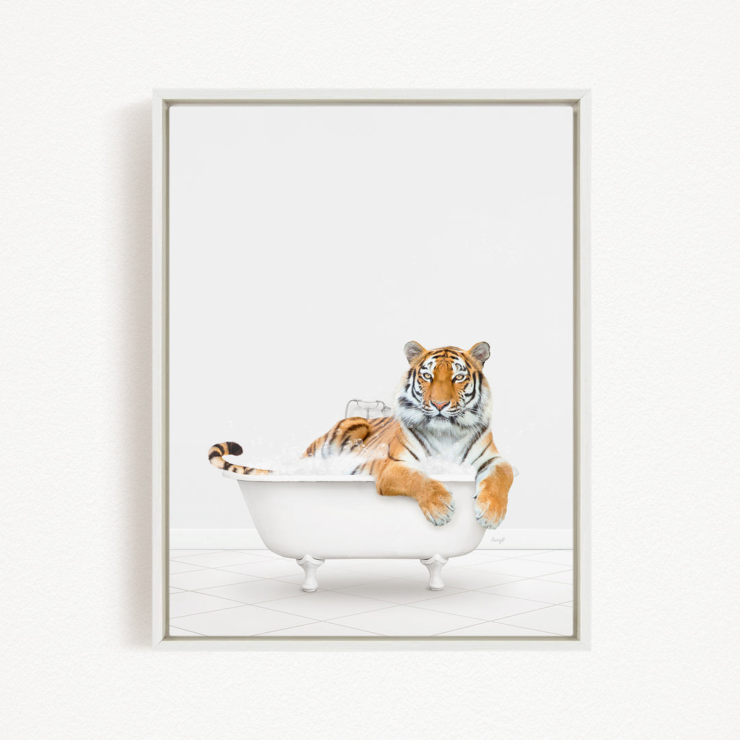 A tiger is sitting in a white bathtub, appearing relaxed and enjoying the bath.