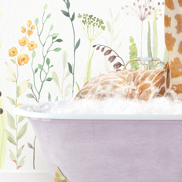 a giraffe laying in a bathtub with a wallpaper behind it