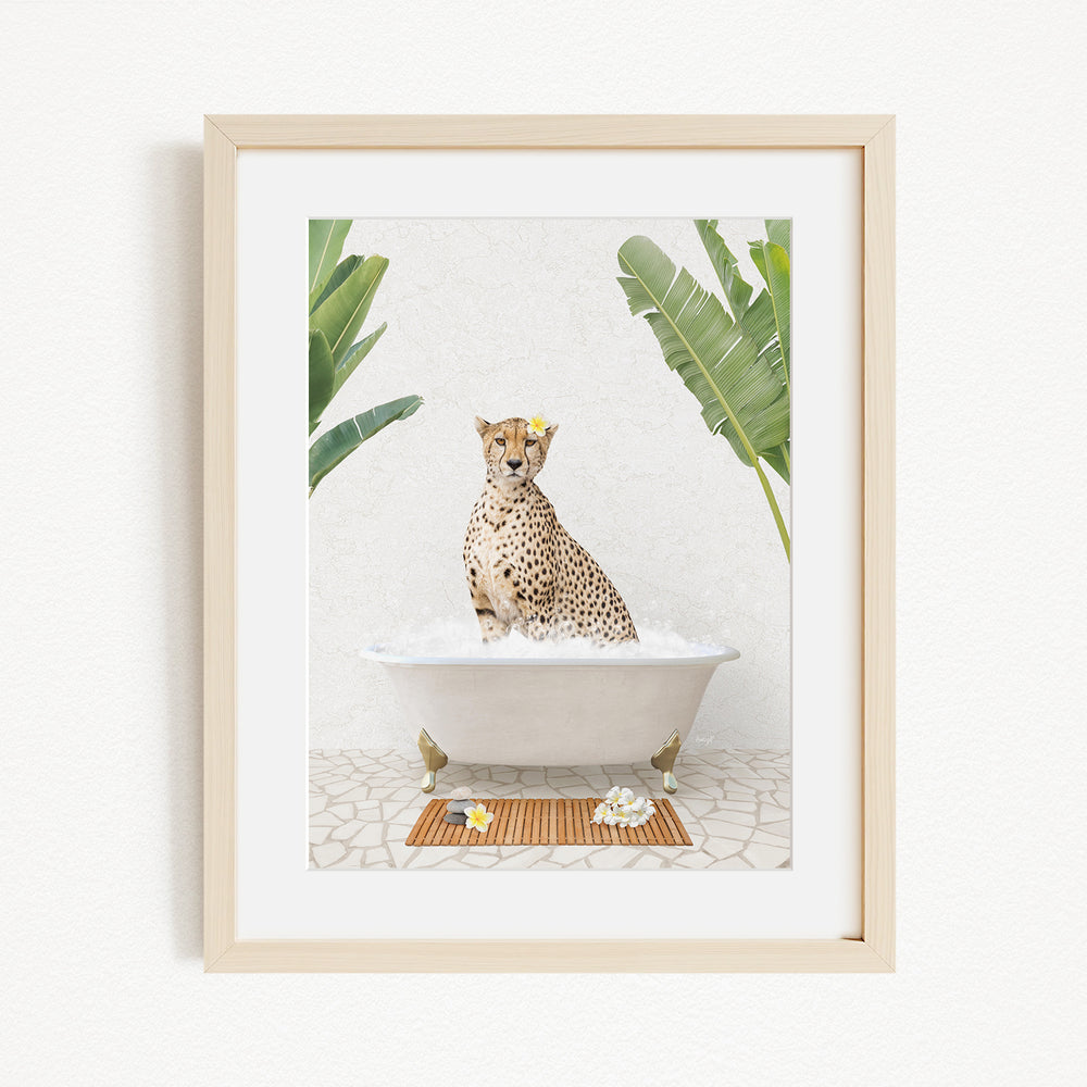 A cheetah sitting in a bathtub filled with water, surrounded by tropical plants.
