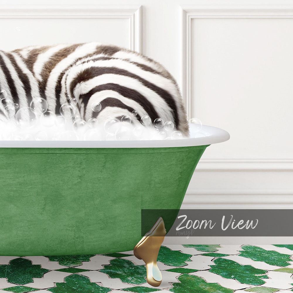A zebra lying in a green bathtub filled with bubbles, with a gold faucet visible.