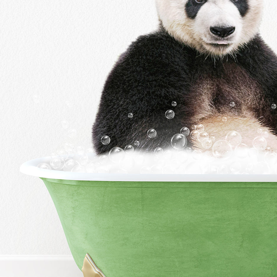 a panda bear sitting in a bathtub with bubbles