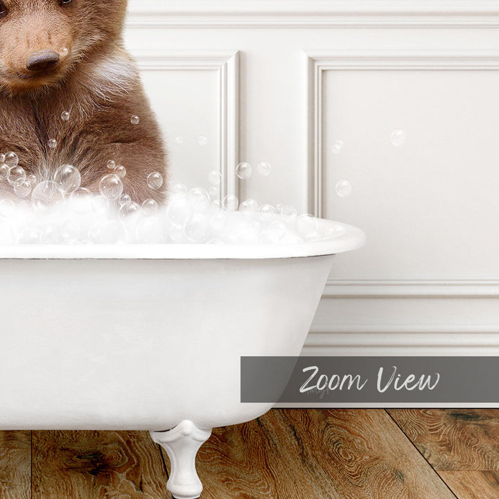 A brown bear sitting in a white bathtub filled with bubbles, creating a whimsical and playful scene.