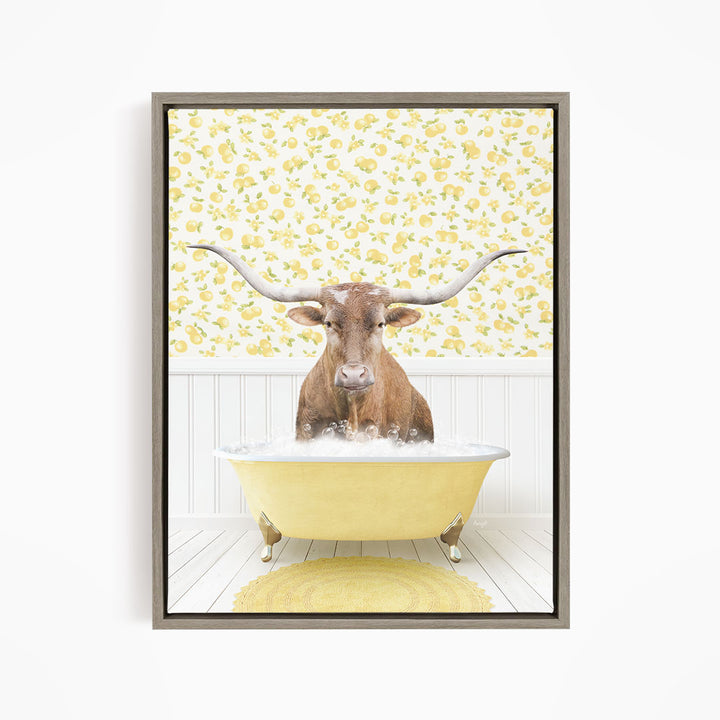 A brown cow with large horns is sitting in a yellow bathtub filled with water, surrounded by a yellow floral pattern on the wall behind it.