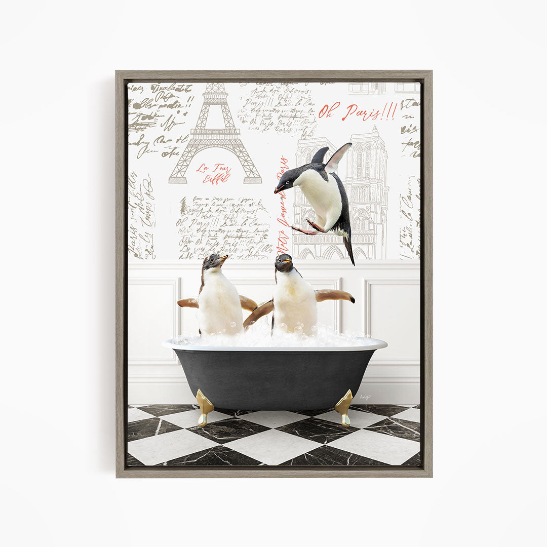 A framed image depicting three penguins sitting in a bathtub, with one penguin flying above the tub.