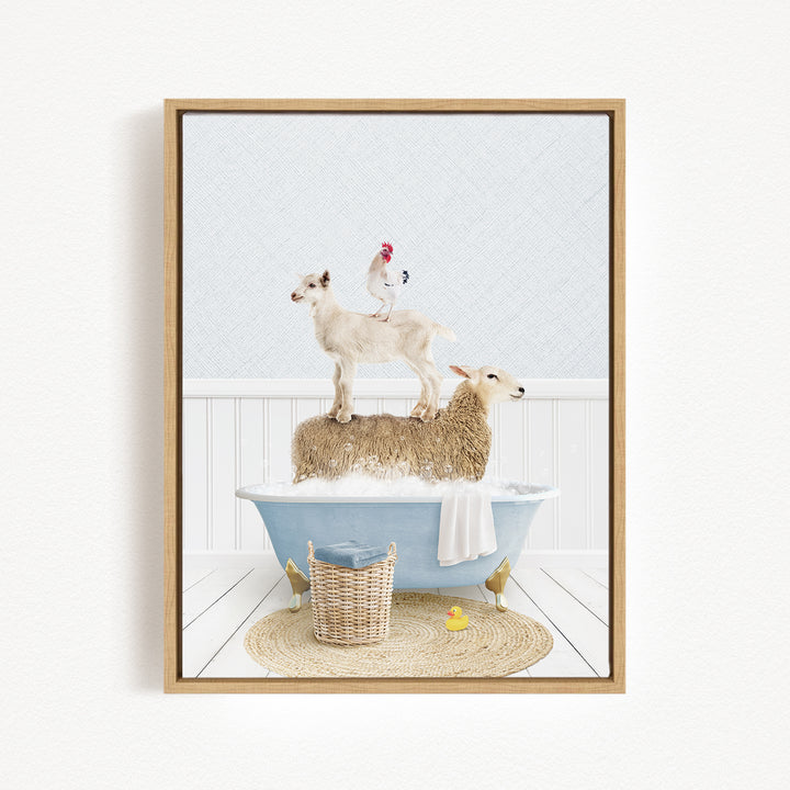 A framed image depicting a sheep standing on a tub filled with bubbles, with a chicken perched on top of the sheep, and a yellow rubber duck floating in the water.