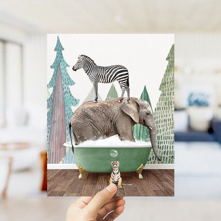 A hand holds up a collage of an elephant, zebra, and tiger bathing in a green bathtub, surrounded by a forest-like background.