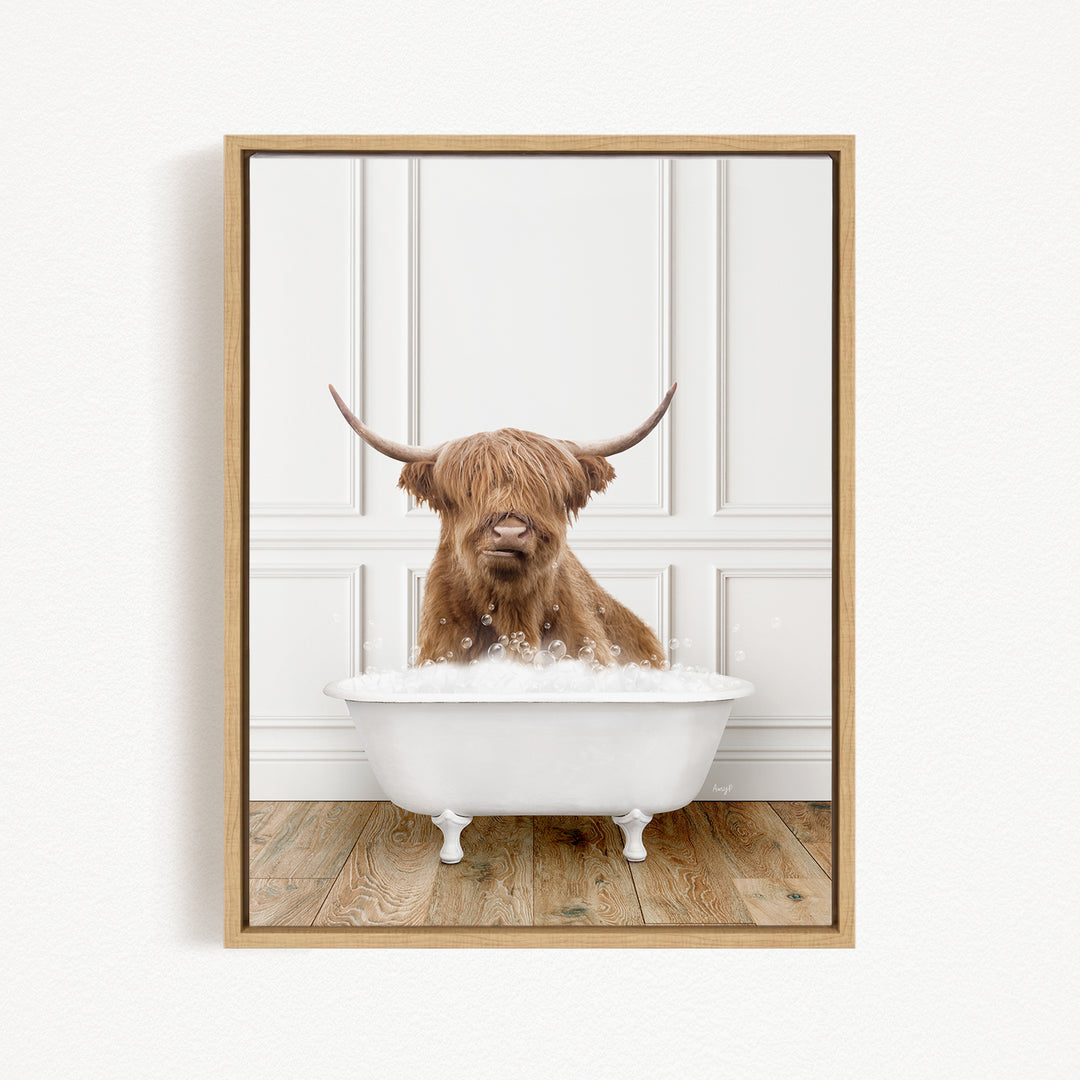 A brown cow with long horns is sitting in a white bathtub filled with water, creating a whimsical and playful scene.