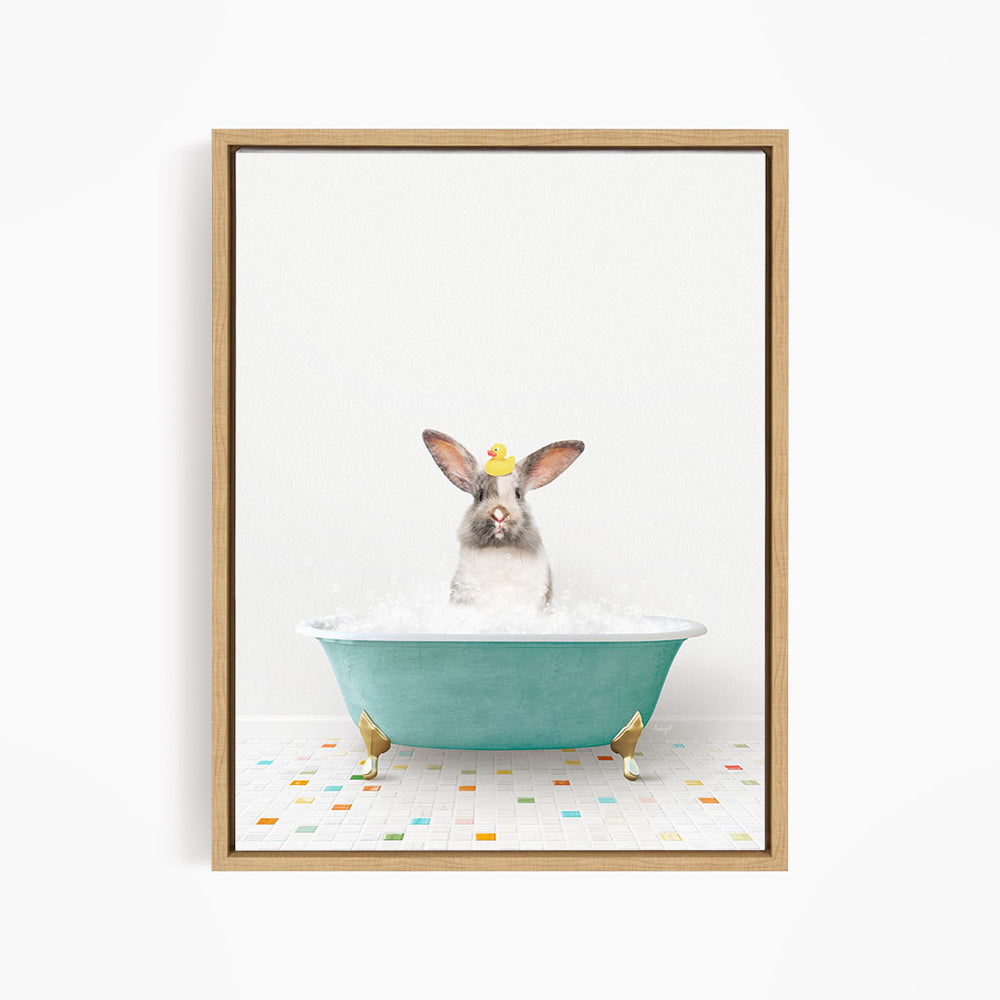 A cute rabbit sitting in a blue bathtub filled with bubbles, wearing a yellow hat.