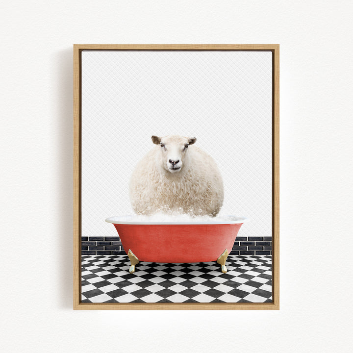 A fluffy white sheep is sitting in a red bathtub filled with bubbles, surrounded by a black and white checkered floor.
