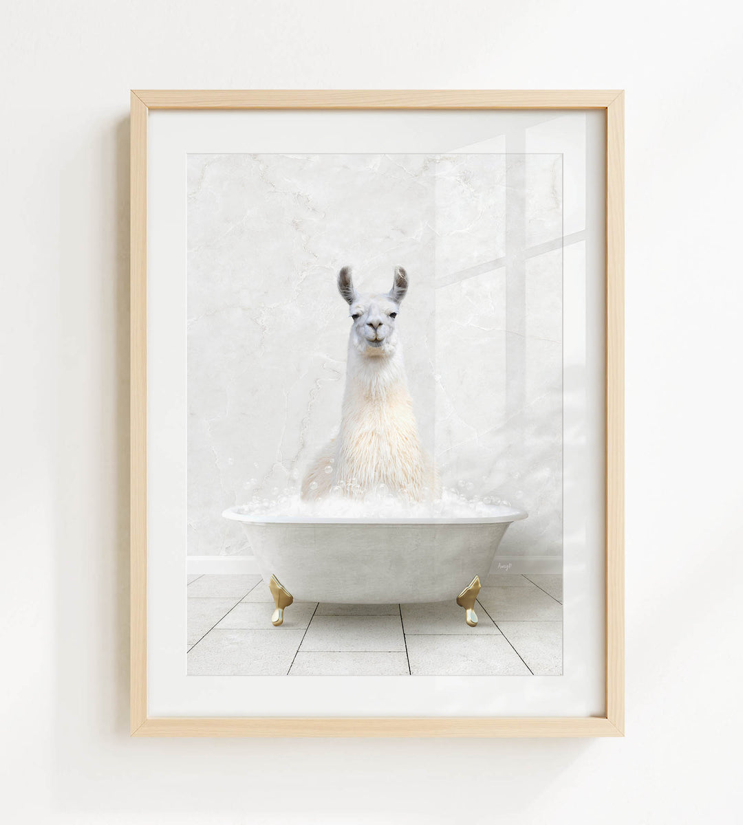 A white llama sitting in a white bathtub filled with bubbles, creating a whimsical and playful scene.