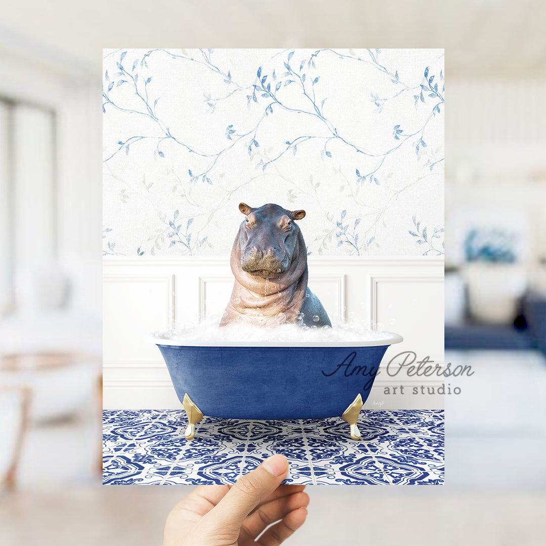 a hippo sitting in a bathtub with a blue background