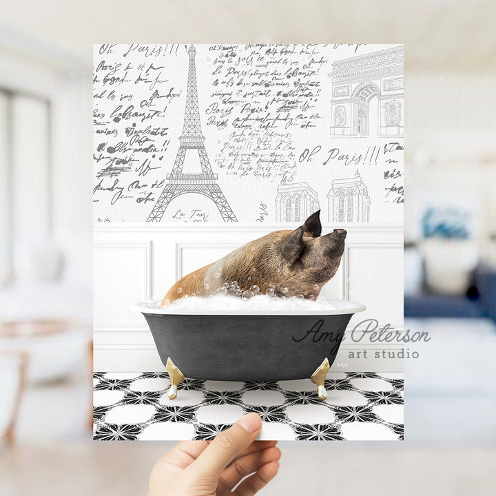 a dog taking a bath in a black and white bathtub