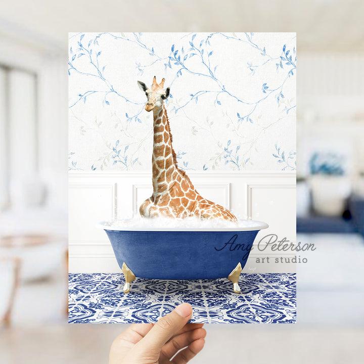 a giraffe sitting in a blue bath tub