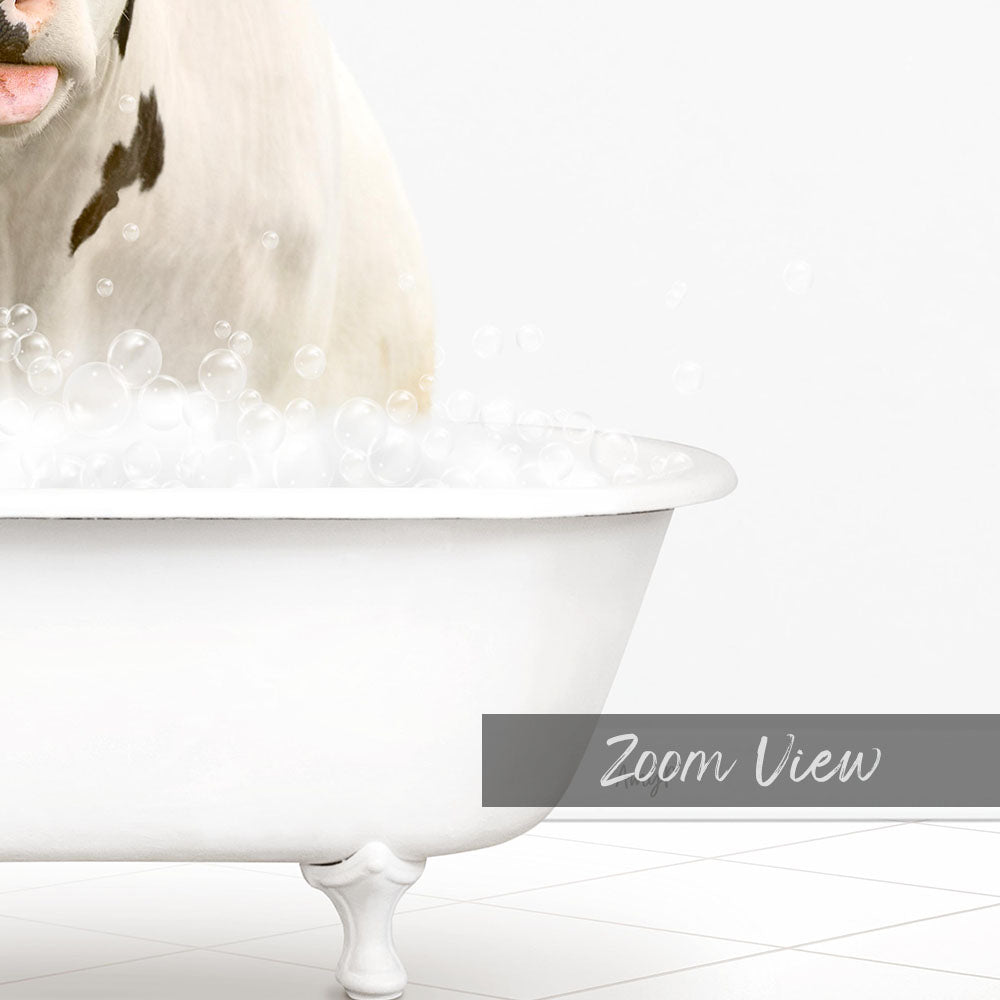 A white bathtub filled with bubbles, with a dog standing inside it.