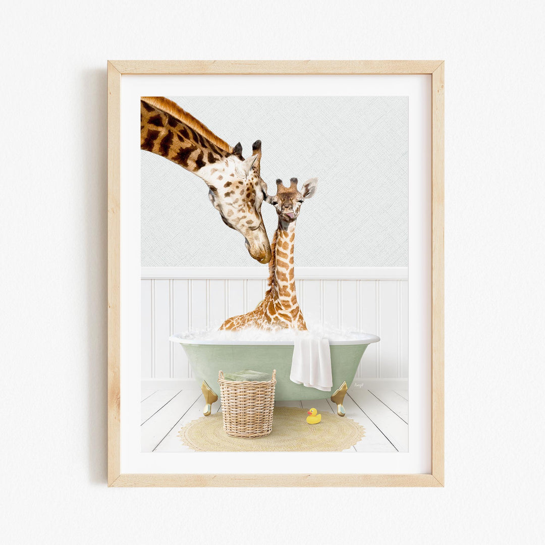 A giraffe and a baby giraffe are sitting in a green bathtub, with a basket of rubber ducks nearby.