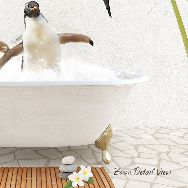 A penguin sitting in a bathtub filled with bubbles, surrounded by a wooden bath mat, rocks, and flowers.