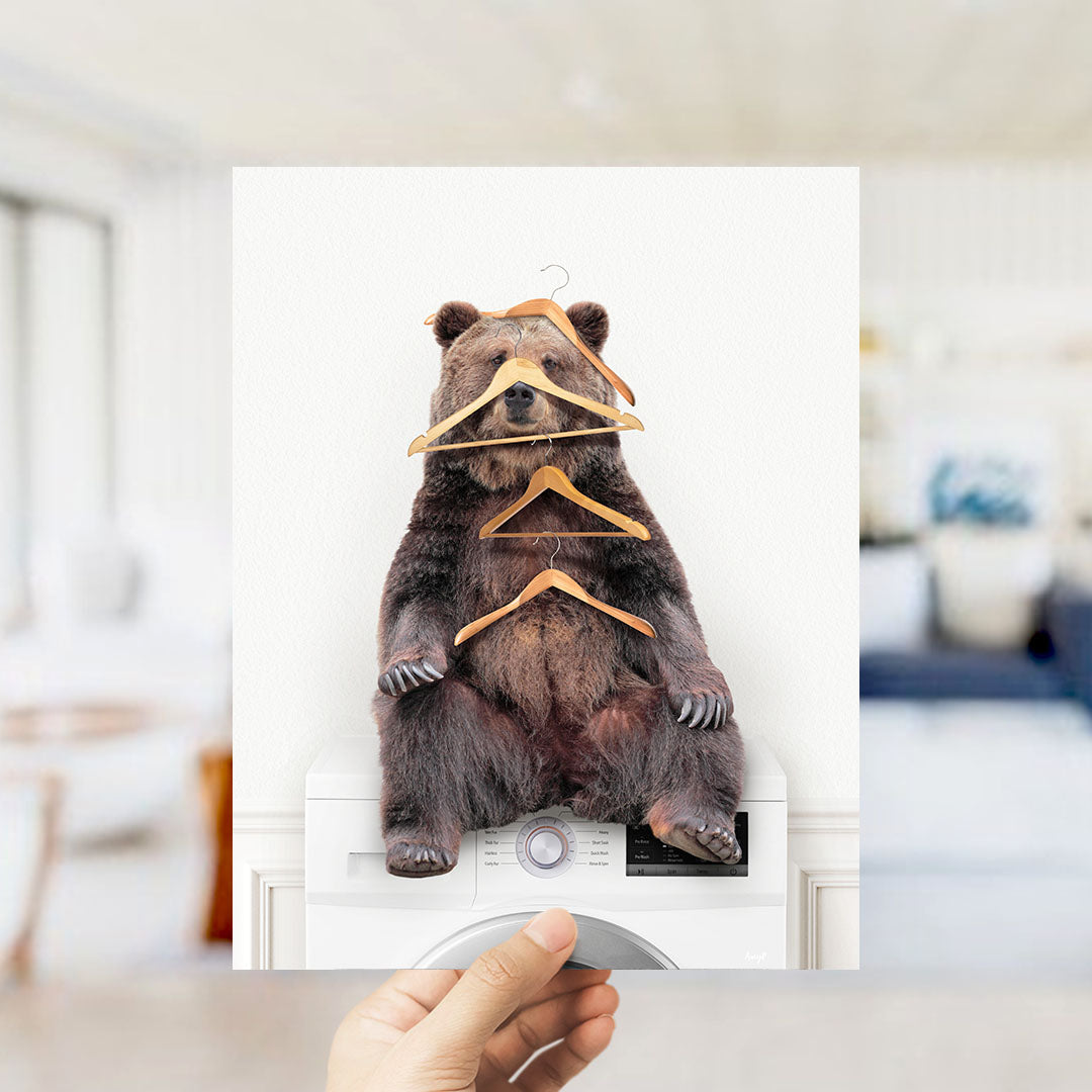 Bear Wearing Clothes Hangers on Washing Machine - Simple White Wall