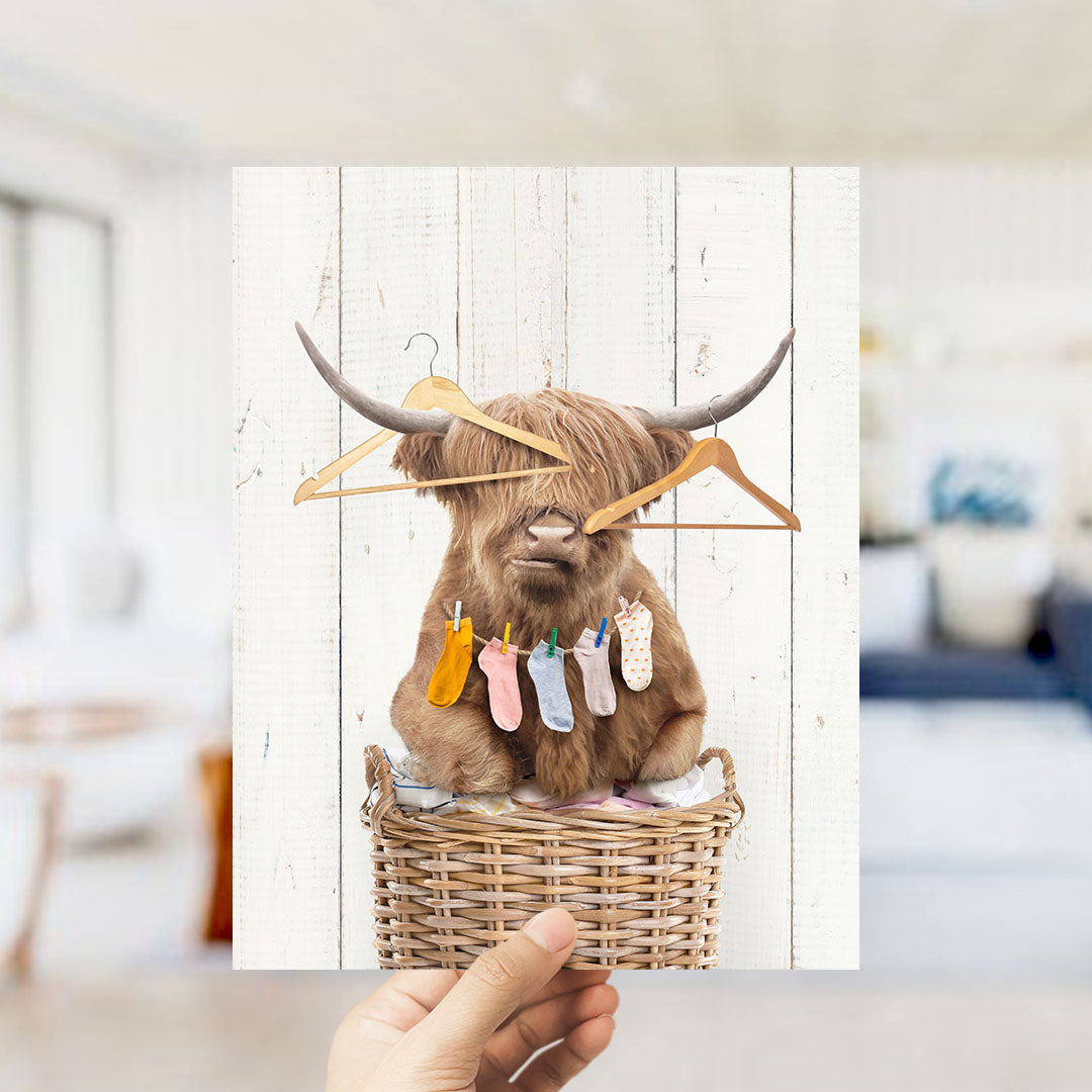 Highland Cow On Laundry Basket with Hangers and Socks "I Herd It's Laundry Day"