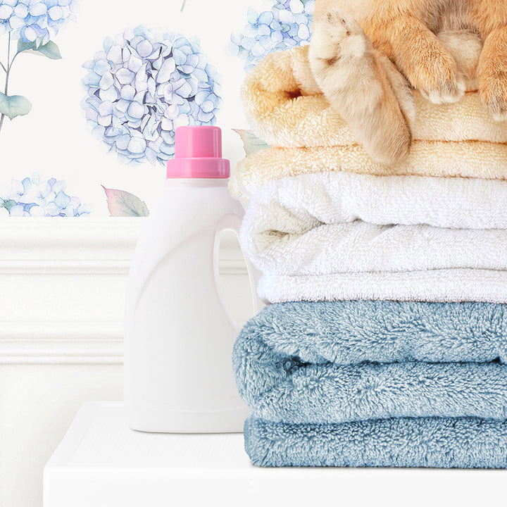 Pudgy Bunny Sitting on Towels on Washing Machine - Assorted Wallpapers